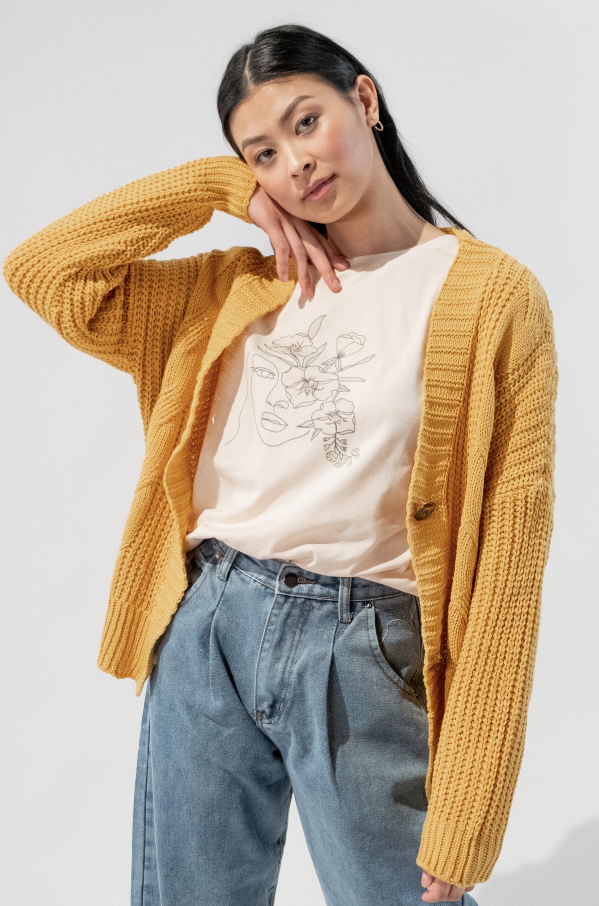 Model wearing a Floral Gal Graphic T-Shirt with vibrant floral design