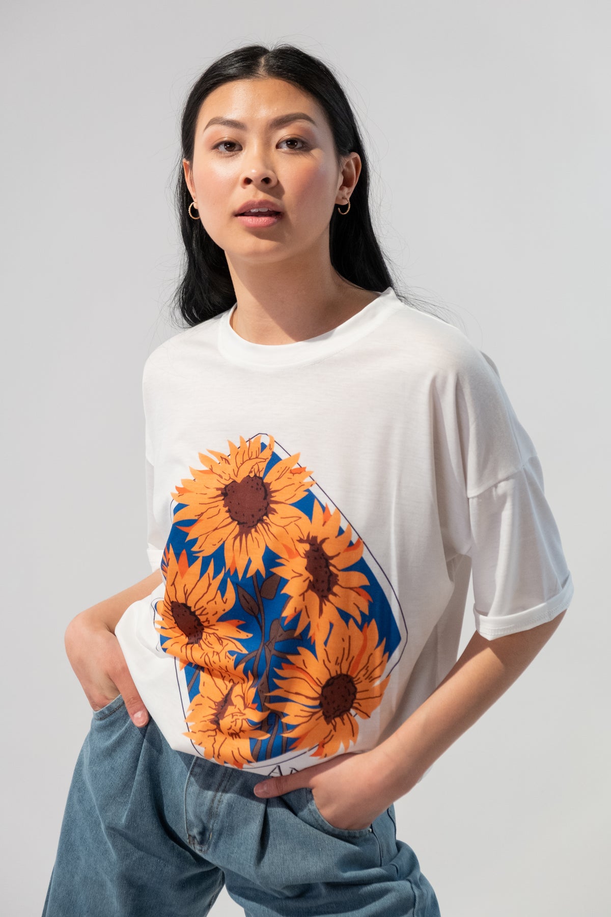 Sunny Flowers Graphic Oversized T-Shirt featuring a vibrant floral print