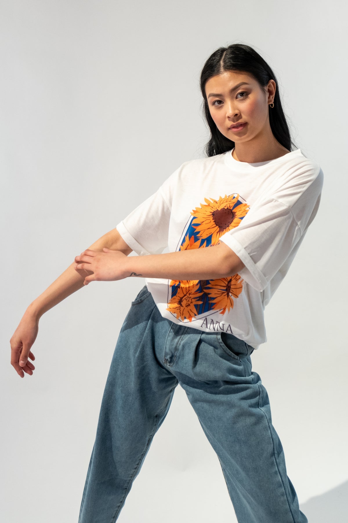 Sunny Flowers Graphic Oversized T-Shirt featuring a vibrant floral print
