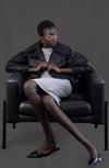 Model wearing the asym vegan leather oversized jacket. Size medium 