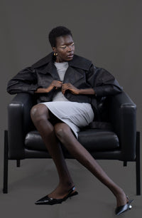 Model wearing the asym vegan leather oversized jacket. Size medium 