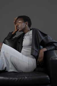 Model wearing the asym vegan leather oversized jacket. Size medium 